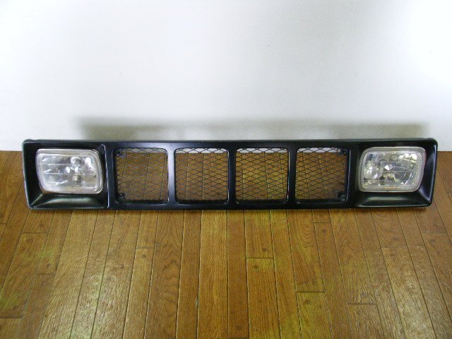 JA11 Jimny . attaching ...JA71 Jimny original front grille extra head light attaching junk treatment please *** P4152