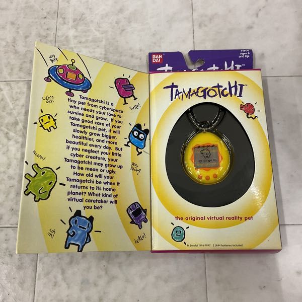 1円〜 バンダイ 初代たまごっち 海外版 イエロー×オレンジ 1円〜 バンダイ 初代たまごっち 海外版 イエロー×オレンジ