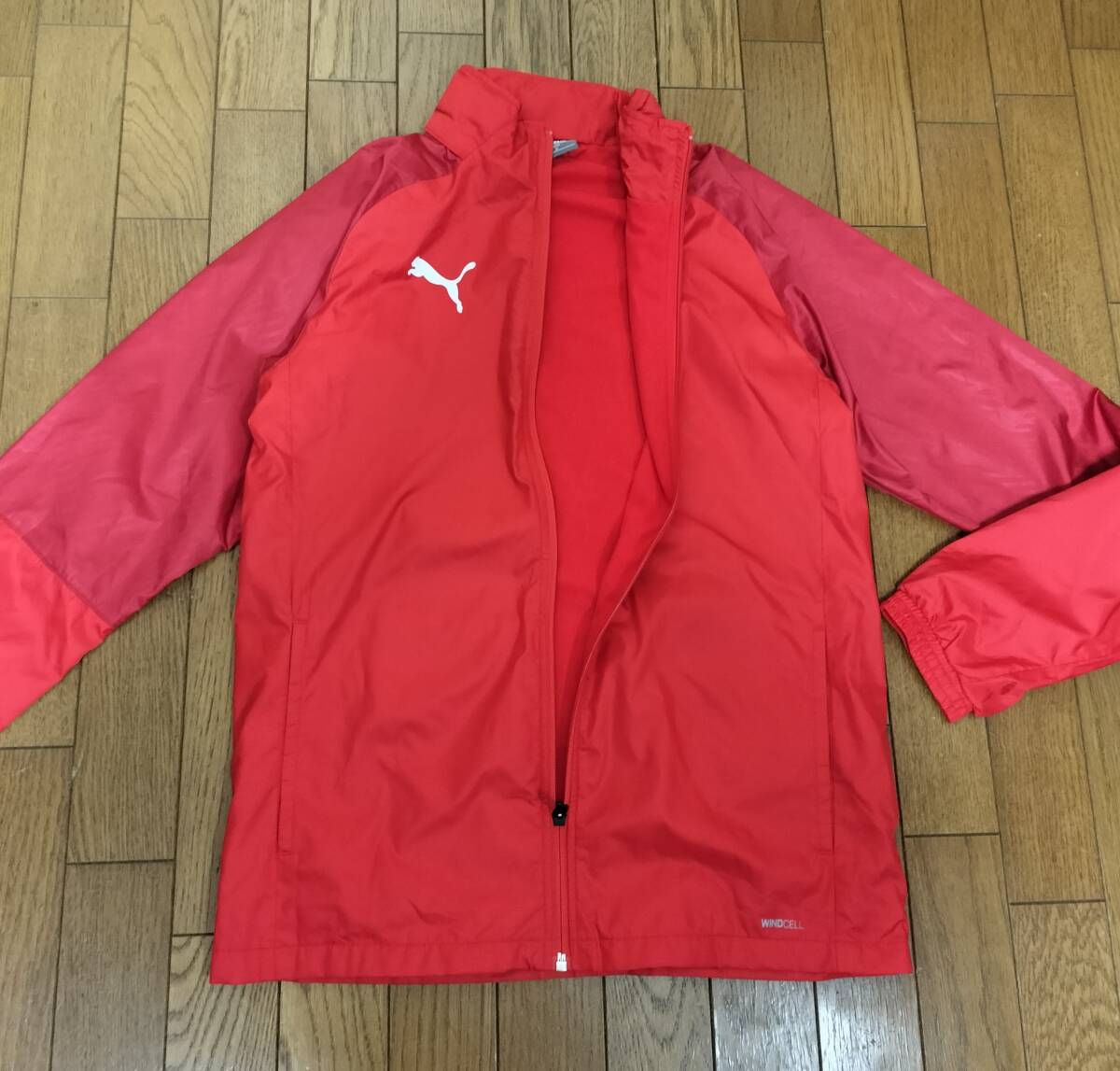 (物5)　　定価9,900円　プーマ　TEAM CUP　裏起毛　防風ウィンドジャケット　656545　赤　メンズM 紙タグ無し
