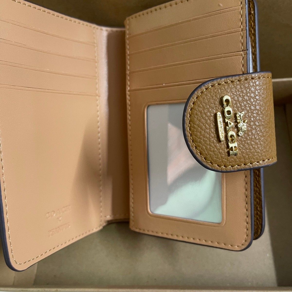 ✨️COACH新品未使用✨️スヌーピー 二つ折り財布 ホワイト 新品未使用 COACH コーチ 二つ折り財布 スヌーピー ホワイト