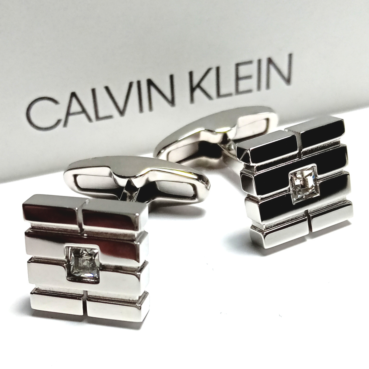 【ckc2】CALVIN KLEIN CKカルバンクライン カフス カフリンクス シルバー×クリアストーン スクエア 新品_画像1