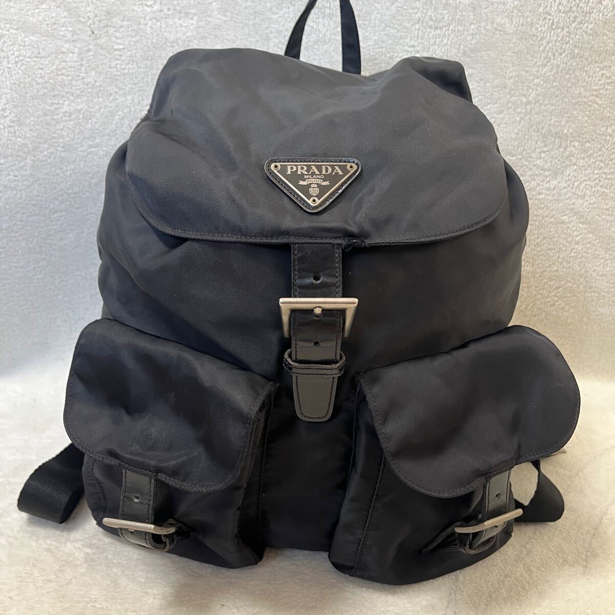 PRADA プラダ リュックサック バックパック 三角ロゴプレート テスートナイロン レザー 巾着型　カバン　鞄　ブラック 黒