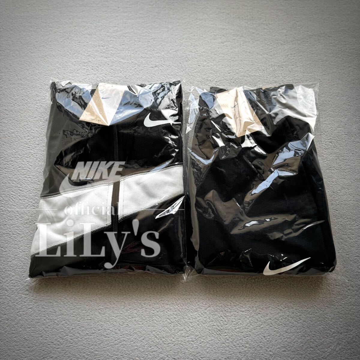 新品 NIKE上下セットアップ Lサイズ 黒白 ビッグスウォッシュ 新品 NIKE上下セットアップ Lサイズ 黒白 ビッグスウォッシュ