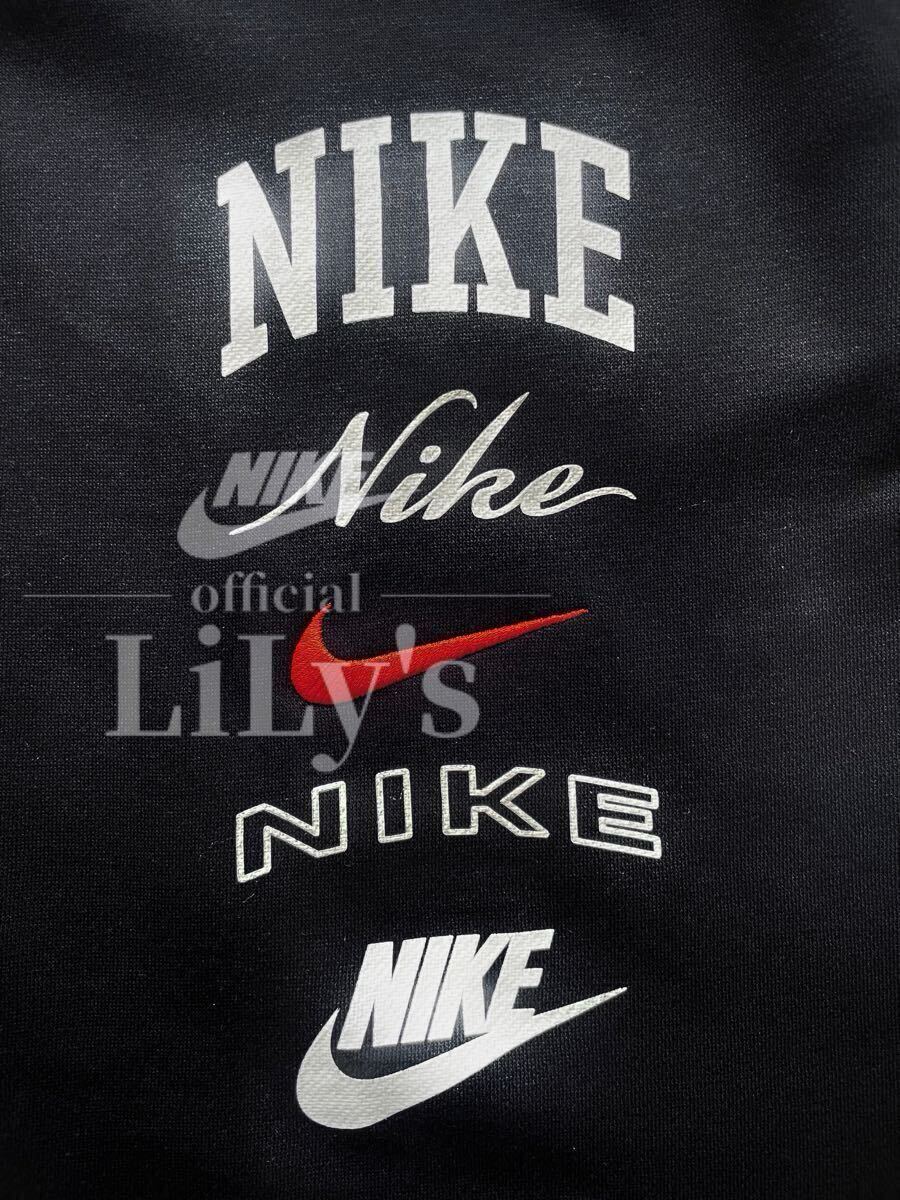 新品 NIKE上下セットアップ 黒 上下Lサイズ ブラック オレンジ 新品 NIKE上下セットアップ 黒 上下Lサイズ ブラック オレンジ