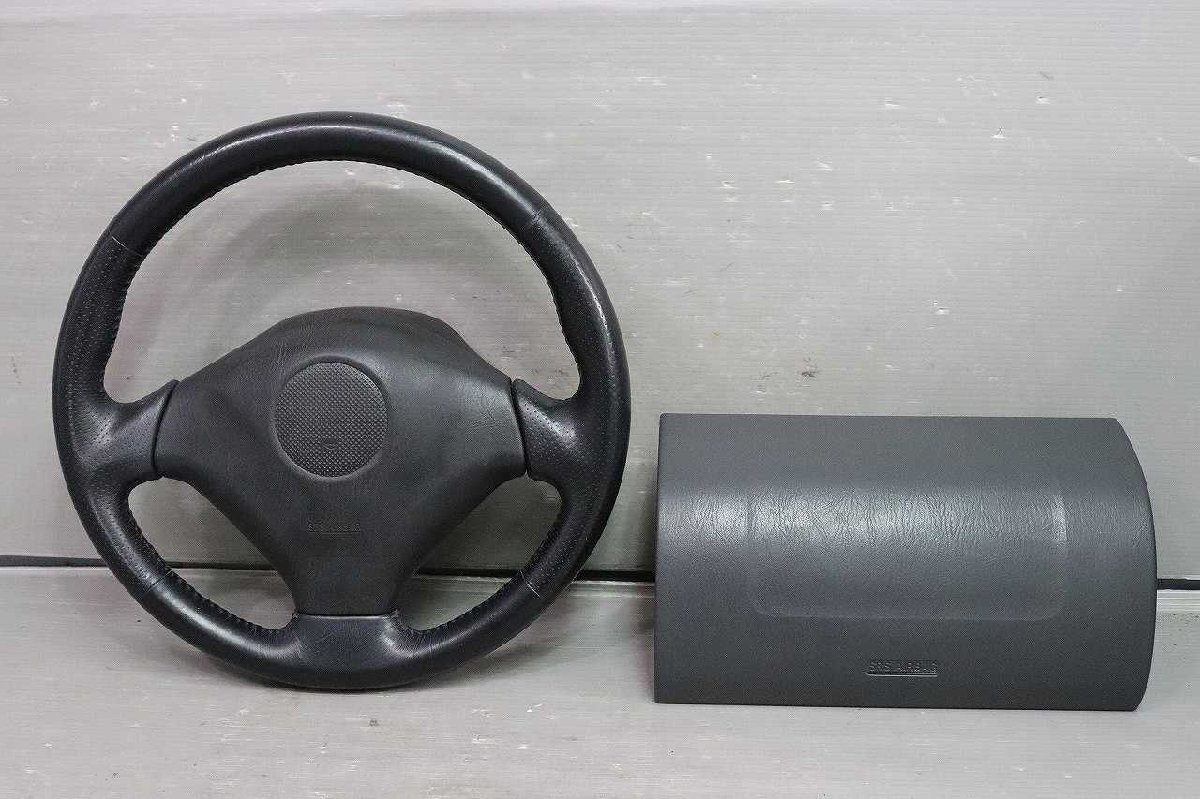 ジムニー ランドベンチャー ターボ AT 4型 (JB23W) ハンドル ステアリングホイール ホーンパット側 エアバックカバー レザー p048532