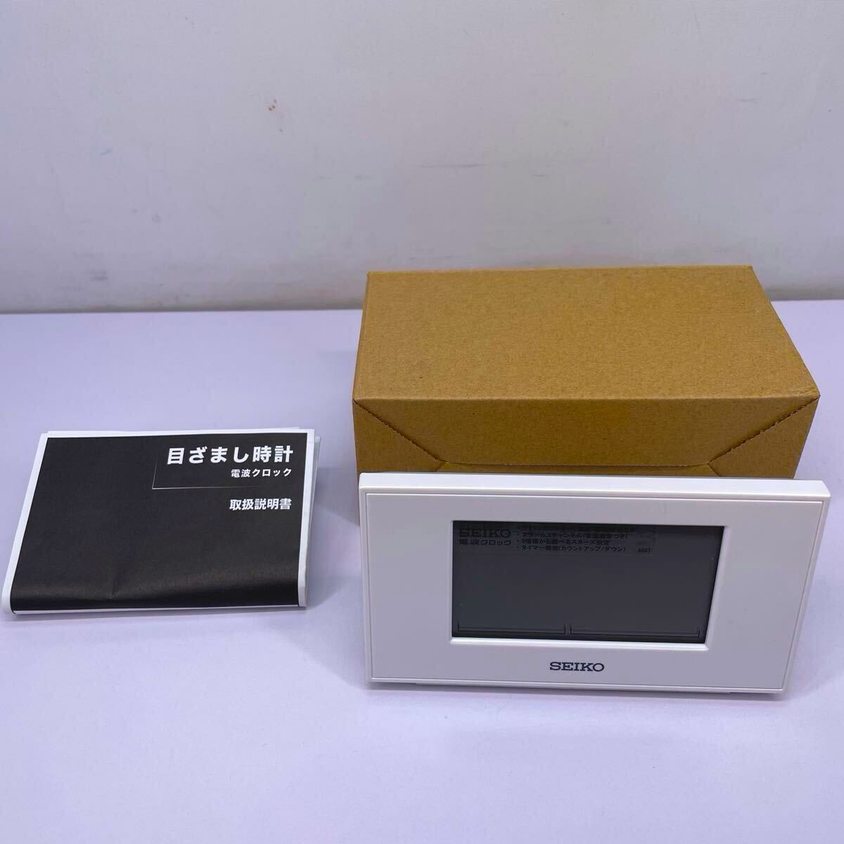 サ) [未使用] SEIKO セイコー 電波目覚まし時計 置き時計 白パール SQ790W 管理M