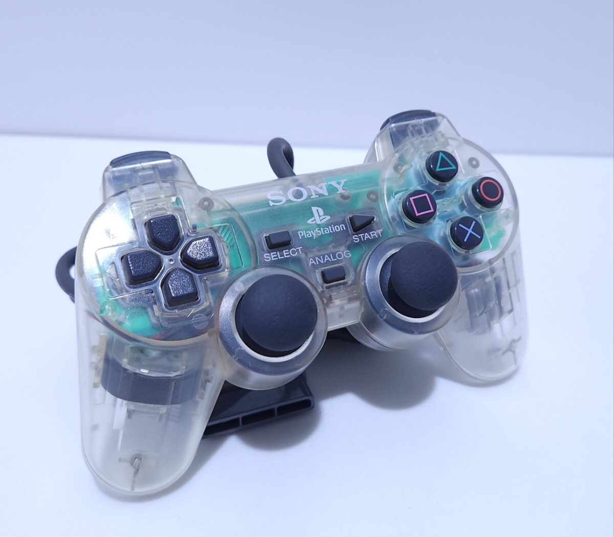 SONYソニー プレイステーションPS1コントローラ デュアルショック 動作確認済みSCPH-1200クリアボディclear body希少品 美品 / 動作品(A-8)