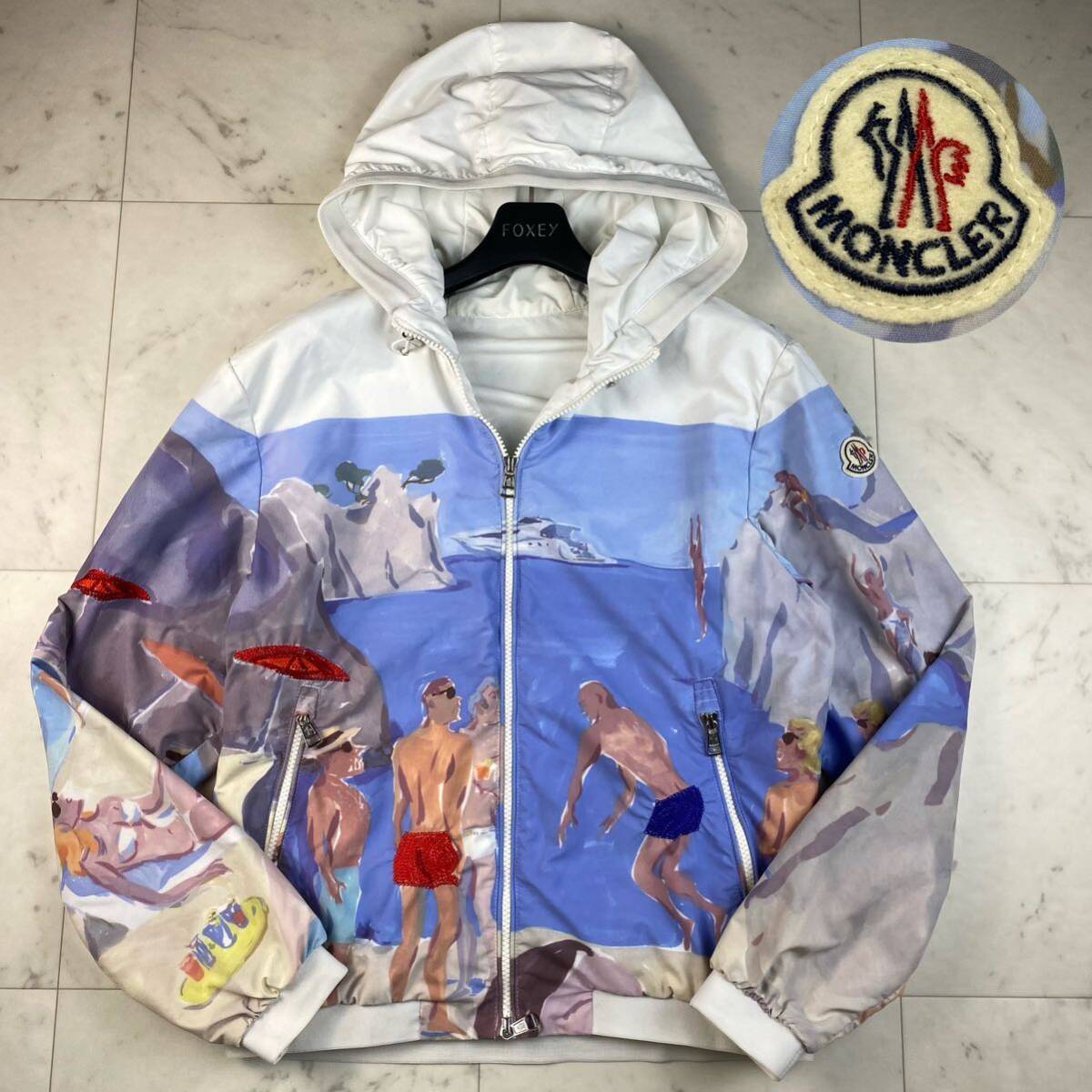 希少◎MONCLER JEANCLAUDE モンクレールジャンクロード ナイロンジャケット パーカー ジップアップ ブルゾン ロゴ刺繍 ビーチ柄 海 白 青