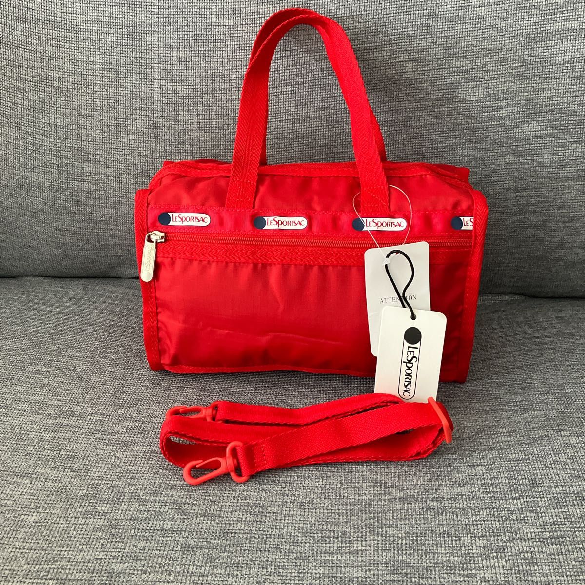 入手不可能！'93Ｊ開幕年 レッズ・ボストンバック 赤のコントラストがお洒落！ セール】横長バッグ フロントダブルポケット ボストンバッグ 赤