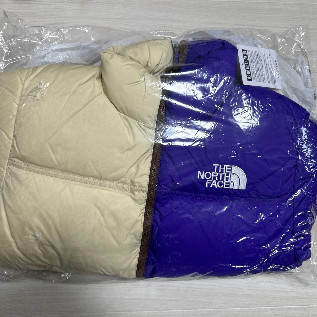 Supreme x The North Face Split Nuptse Jacket Tan Supreme x The North Face Split Nuptse Jacket Tan