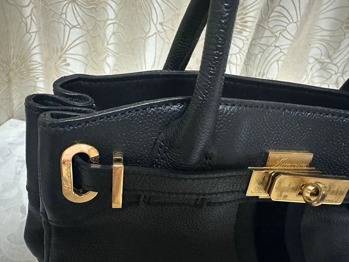 美品 A D M J ハローキティコラボトートバッグ レザー 美品 A D M J ハローキティコラボトートバッグ レザー
