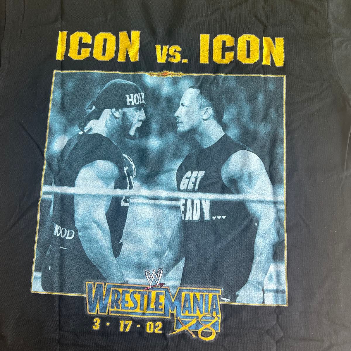 割引クーポン 新品未使用 ロックvsホーガン Tシャツ レッスルマニア18 WWE スポーツ・フィットネス