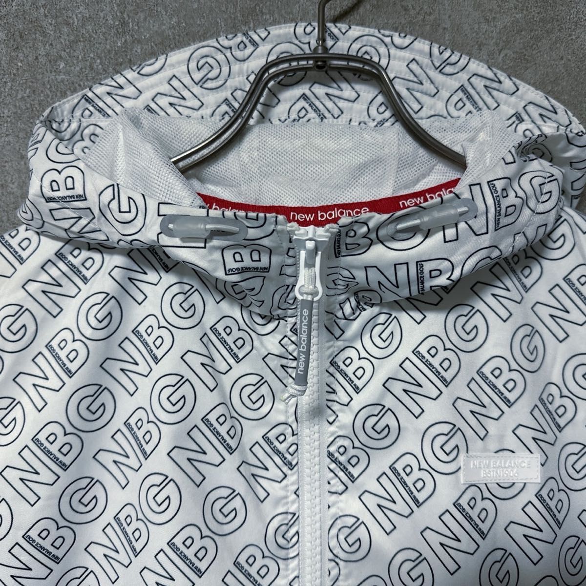 New Balance Golf ニューバランス総柄 ロゴ ナイロン パーカー New Balance Golf ニューバランス総柄 ロゴ ナイロン パーカー