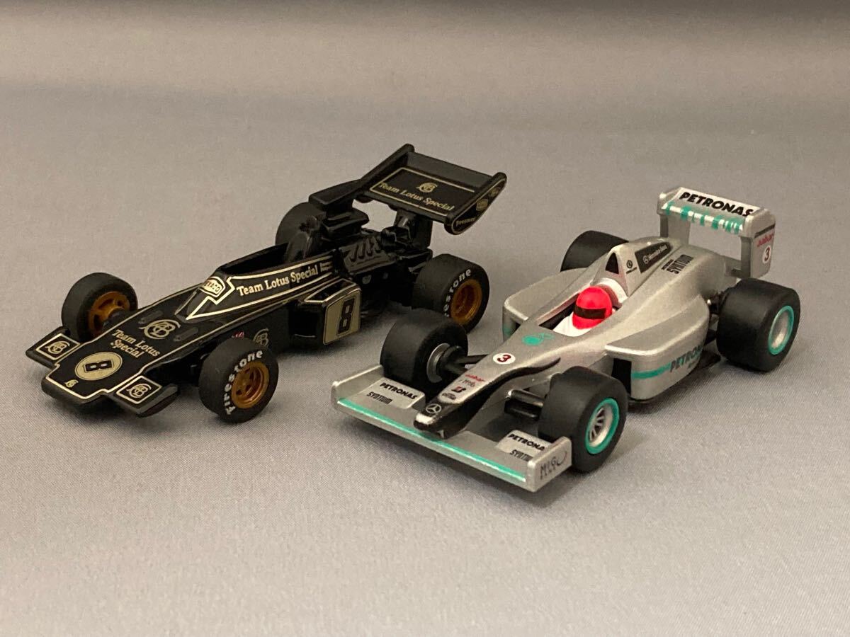 メルセデスGP ペトロナス M.シューマッハ ミニチャンプス 、サントリー ロータスコレクション ロータス 72D プルバックカー セット 中古品