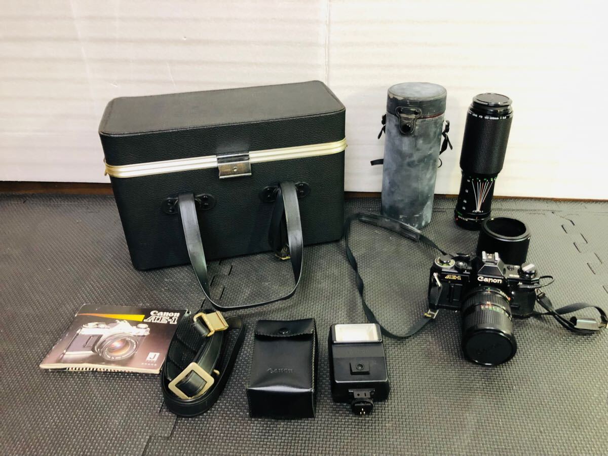 ◆ Canon AE-1 キャノン フィルムカメラ ダブルレンズキット 35-70mm 1:4 100-300mm 1:5.6 ハードケース付き 動作未確認