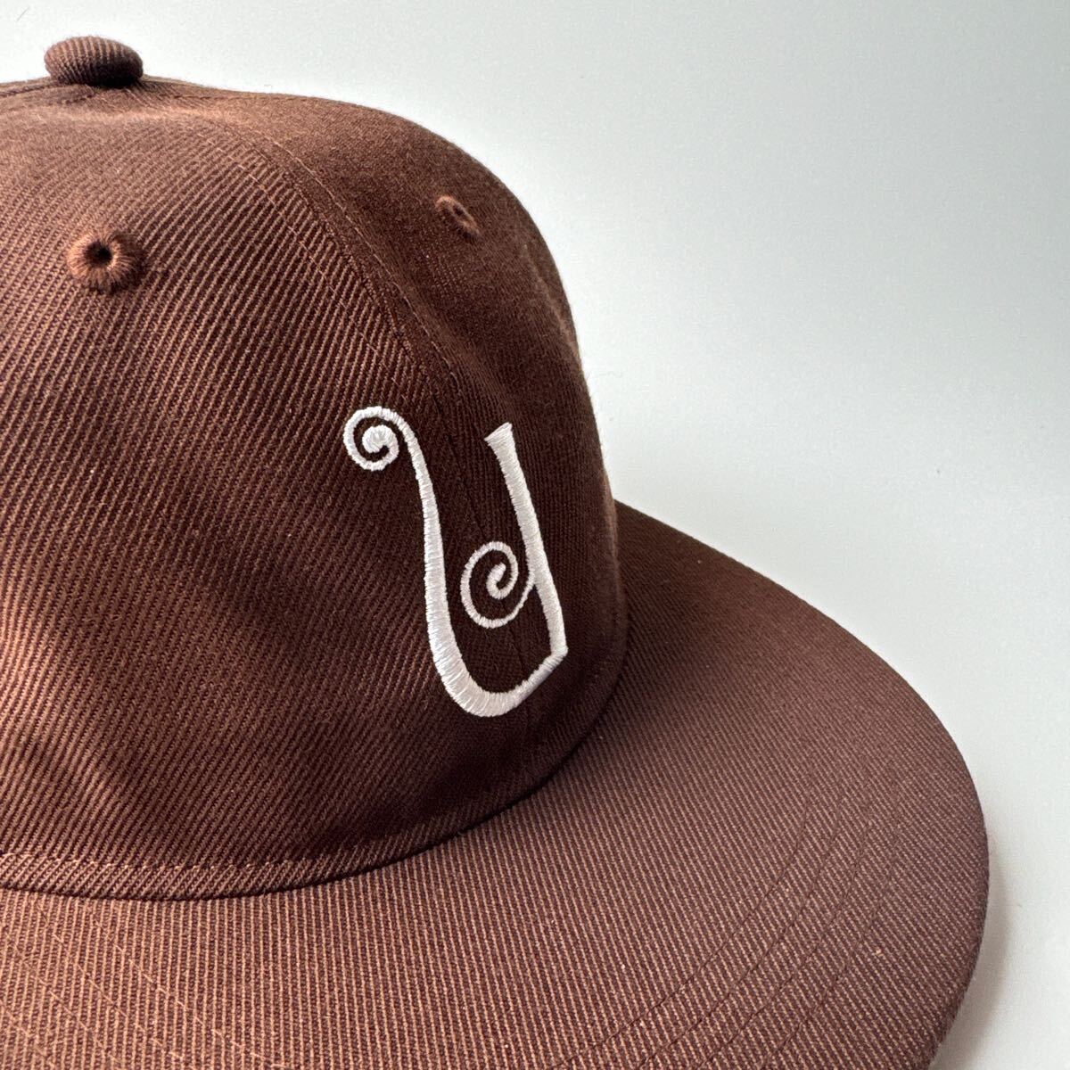 即完売 Unlikely×NEPENTHES NEW YORK CAP ブラウン アンライ 即完売 Unlikely×NEPENTHES NEW YORK CAP ブラウン アンライ