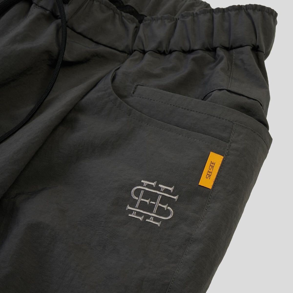 サイズL 新品 SEE SEE WIDE TAPERED EASY PANTS チャコール サイズL 新品 SEE SEE WIDE TAPERED EASY PANTS チャコール