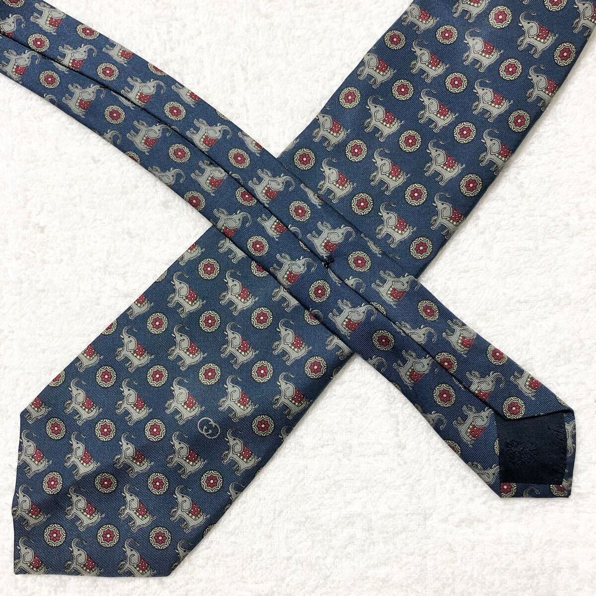 ■美品■GUCCI グッチ　ネクタイ　サーカスのゾウと玉　総柄　イタリア制　ネイビー　ビジネス