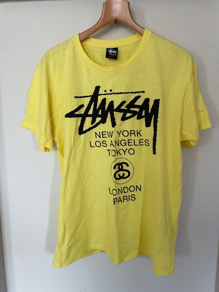 STUSSY ワールドツアー 半袖Tシャツ M イエロー 黄色 STUSSY ワールドツアー 半袖Tシャツ M イエロー 黄色