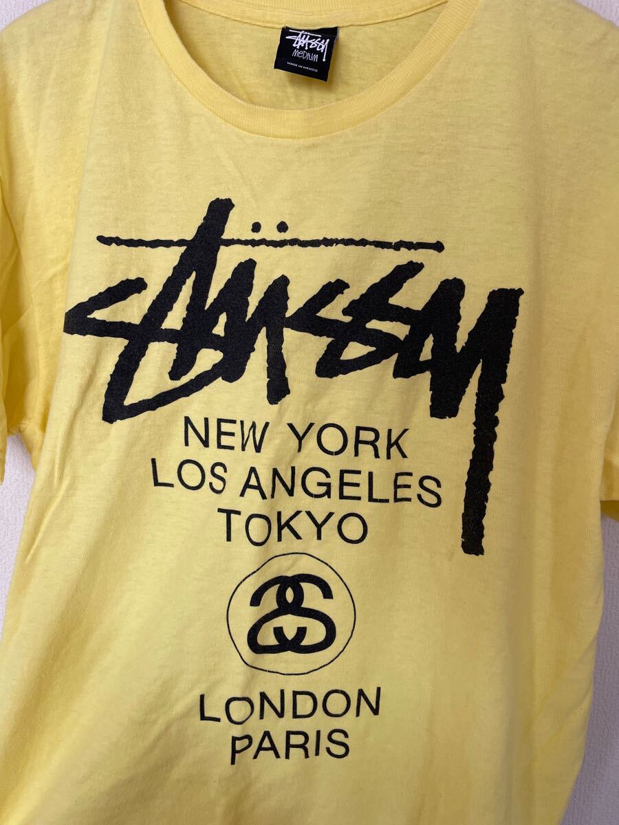 STUSSY ワールドツアー 半袖Tシャツ M イエロー 黄色 STUSSY ワールドツアー 半袖Tシャツ M イエロー 黄色