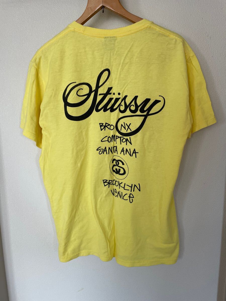 STUSSY ワールドツアー 半袖Tシャツ M イエロー 黄色 STUSSY ワールドツアー 半袖Tシャツ M イエロー 黄色