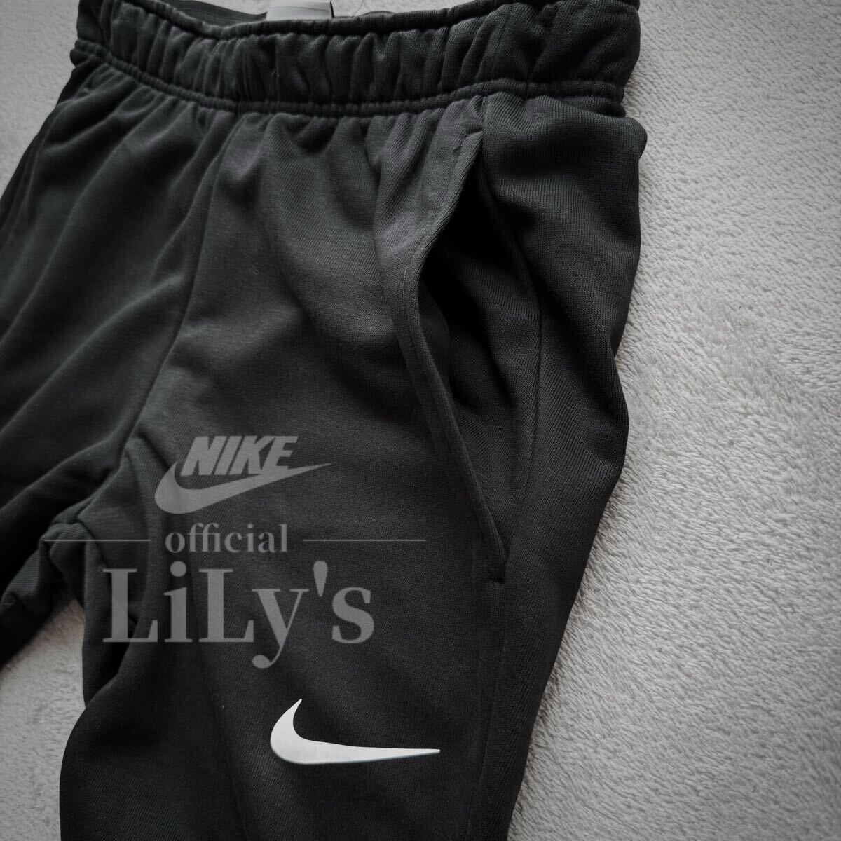 新品 ナイキ上下セットアップ Mサイズ スウォッシュ NIKE 黒白 新品 ナイキ上下セットアップ Mサイズ スウォッシュ NIKE 黒白