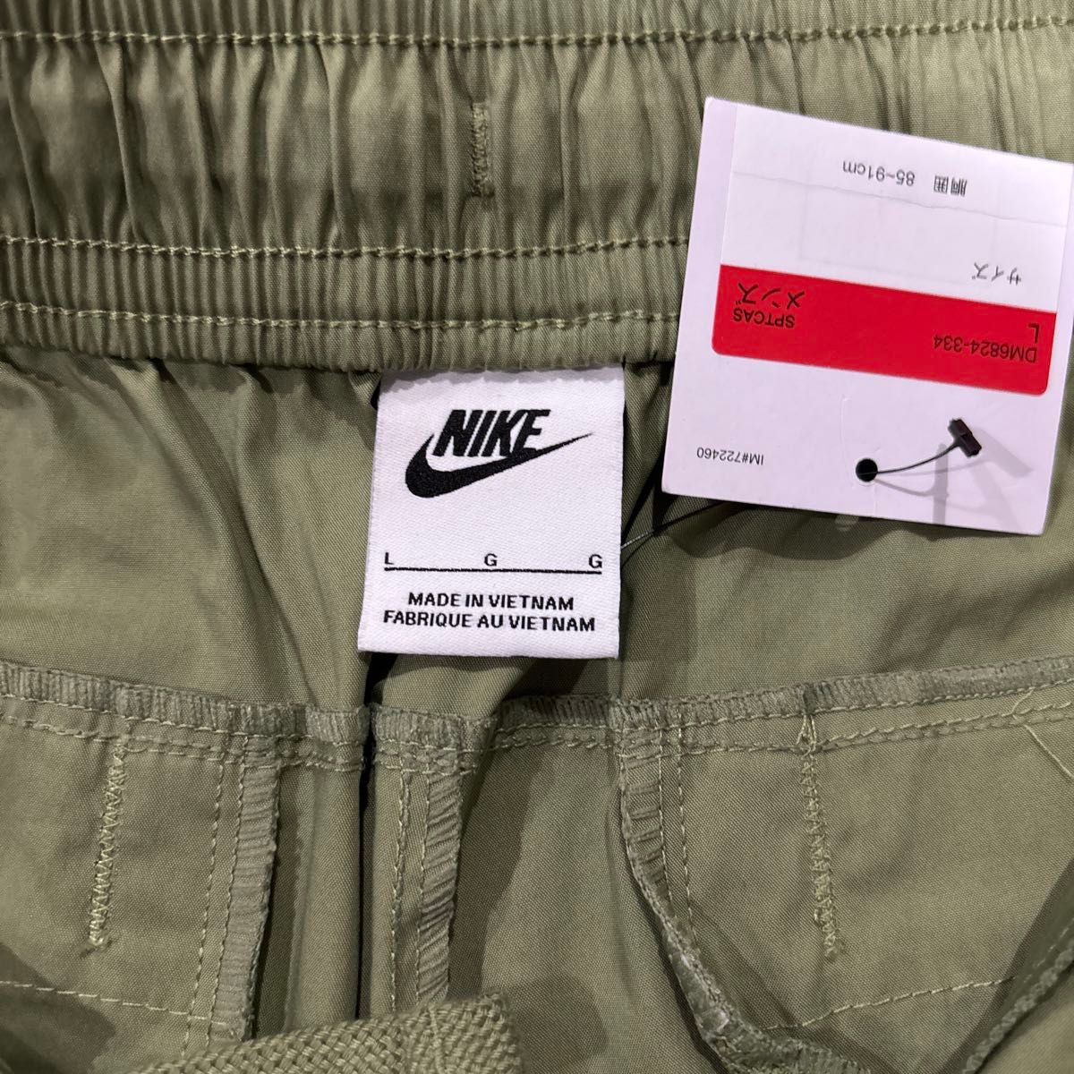 新品 NIKE ナイキ ナイロンパンツ 刺繍ロゴ カーキ ウーブン 新品 NIKE ナイキ ナイロンパンツ 刺繍ロゴ カーキ ウーブン