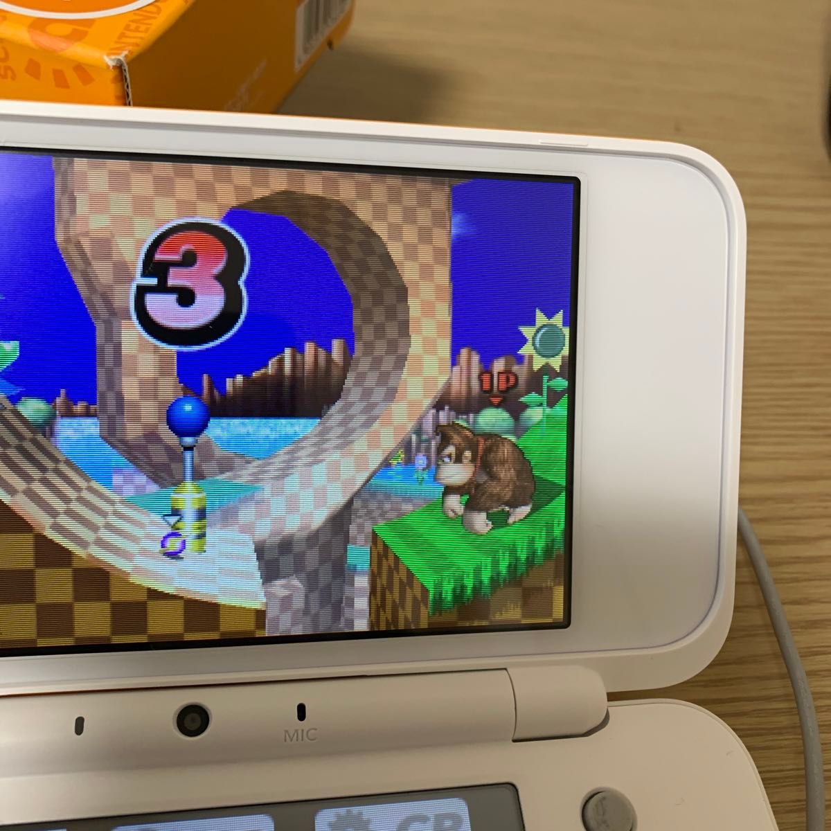 Newニンテンドー2DS LL ホワイト×オレンジ(美品)とソフト(大乱闘 Newニンテンドー2DS LL ホワイト×オレンジ(美品)とソフト(大乱闘