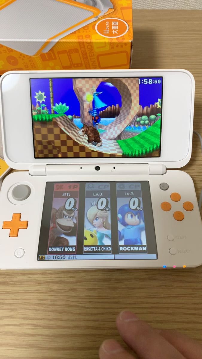 Newニンテンドー2DS LL ホワイト×オレンジ(美品)とソフト(大乱闘 Newニンテンドー2DS LL ホワイト×オレンジ(美品)とソフト(大乱闘