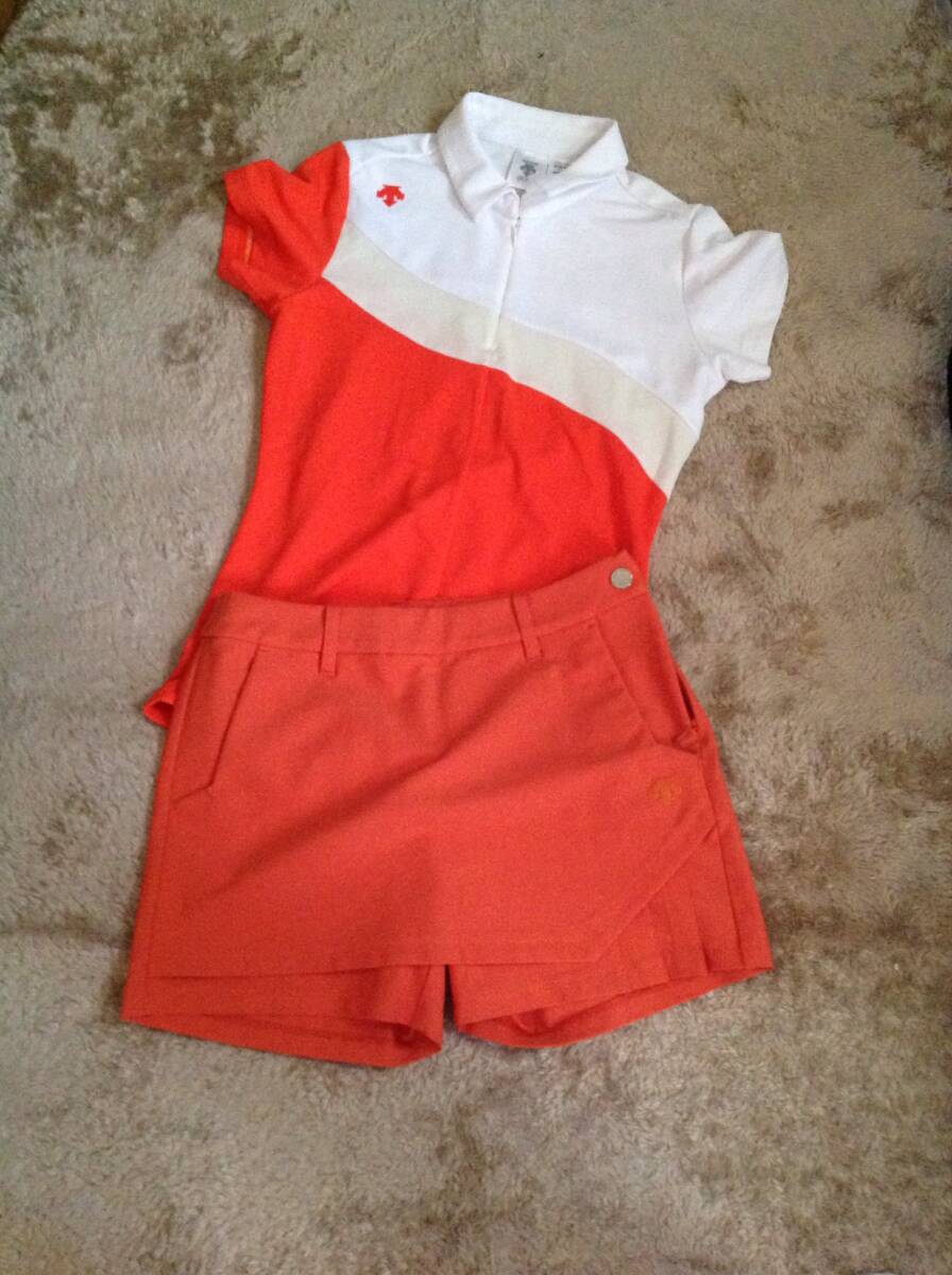 超お値打ち出品 小さめサイズ DESCENT GOLF Lady's ストレッチジップアップポロシャツと変則キュロットのコーデ オレンジ usedほぼ新品