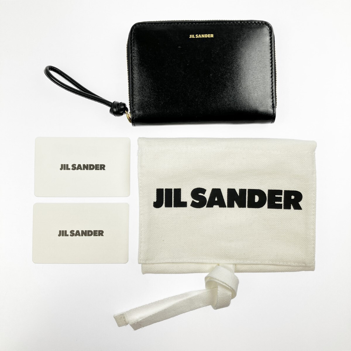 ▽▽ JILL SANDER 二つ折り財布 JO7UI0006 布袋付 ブラック やや ▽▽ JILL SANDER 二つ折り財布 JO7UI0006 布袋付 ブラック やや