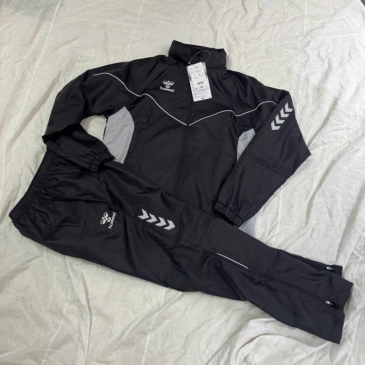 新品未使用品★hummel ヒュンメル★メンズ Mサイズ 『ウィンドブレーカージャケット・パンツ』黒 上下セット HAW2165/2165P(90)
