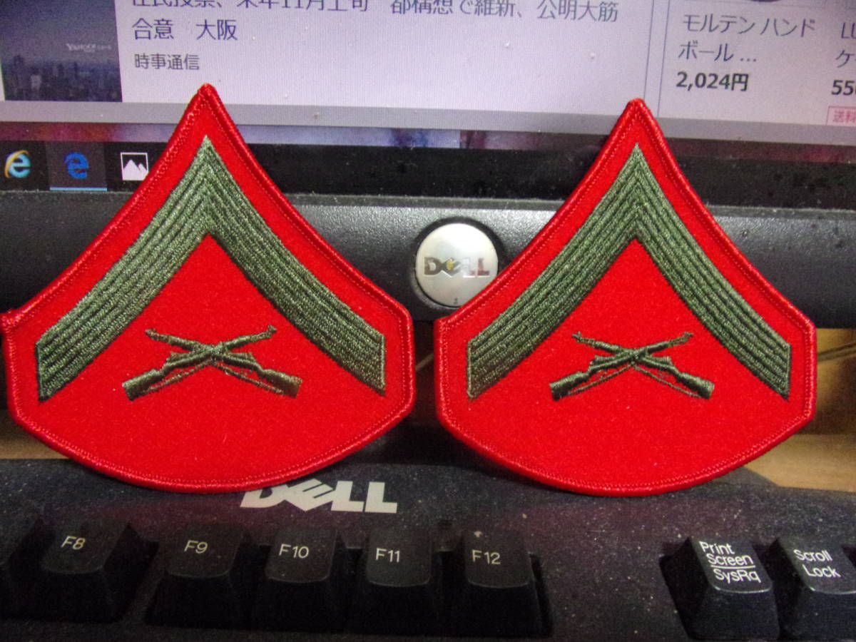  America sea ..(MARINES) rank insignia on etc. .( red ) unused badge 