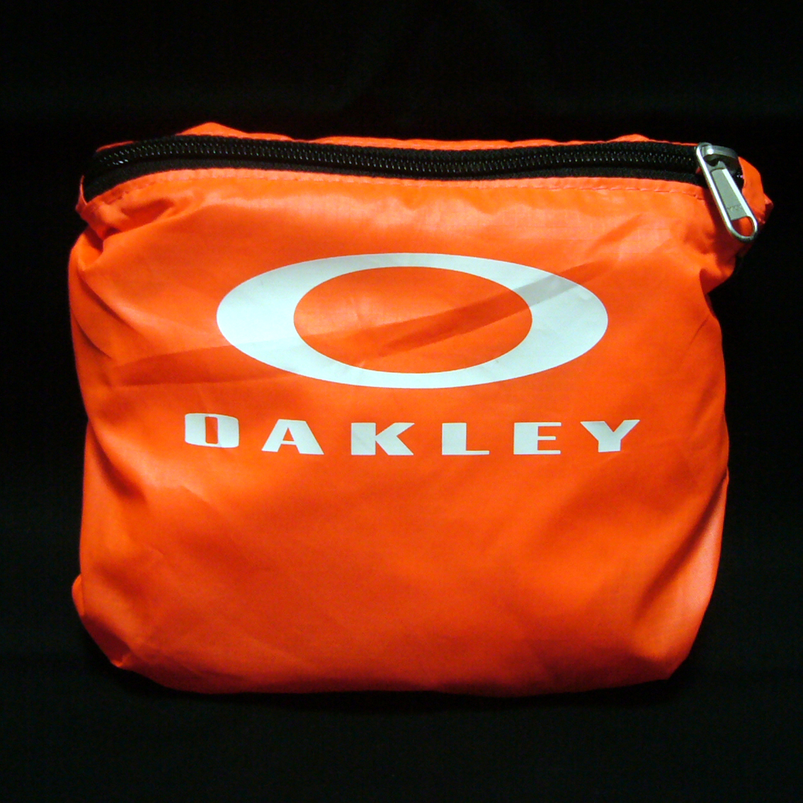 OAKLEY オークリー パッカブル バックパック 92732-84P リュックサック 折りたたみ コンパクト オレンジ アウトドア 登山 キャンプ 新品