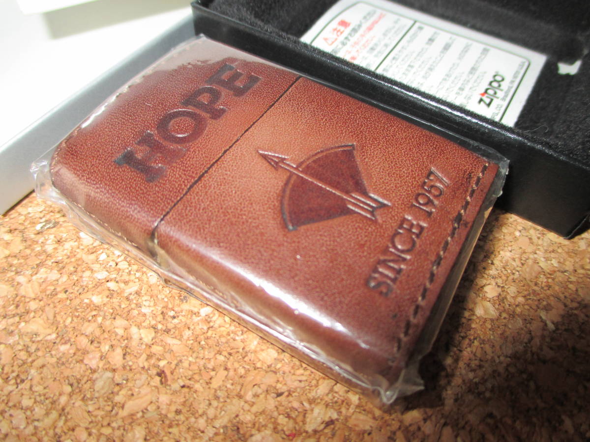 ZIPPO 『JT 日本たばこ HOPE 革巻き SINCE 1957』 ・HP年1月製造 ダークブラウン オイルライター ジッポ－ 廃版激レア 未使用品_画像1