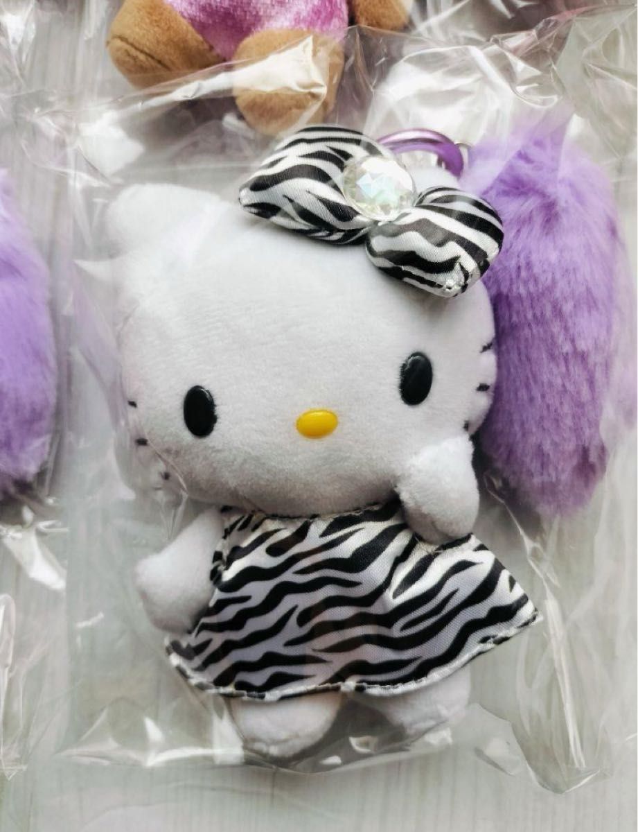 キティちゃんしっぽ付きマスコットキーホルダー 日焼け ヒョウ キティちゃんしっぽ付きマスコットキーホルダー 日焼け ヒョウ