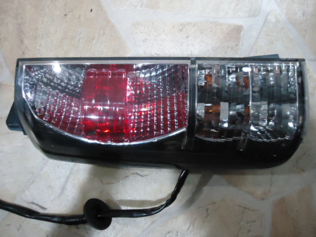  postage included Mitsubishi ek Wagon 15 year tail lamp left lighting verification OK