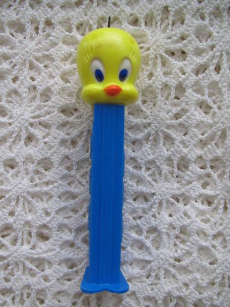 * prompt decision * Old petsu* dispenser [tui- tea ] PEZ made in China wa-na-* Brother sUS PATENT 4.966.305 tweety