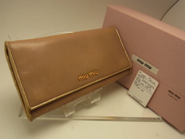 $ 良好品 $ 箱 付き！ ◆ miumiu ◆ ミュウミュウ ◆ ゴールド レザー 長財(cái)布 ◆ ミルク チョコレート色 ◆ 送料無料?。? />
                                    </span> 
                                </div>

								<div   id=