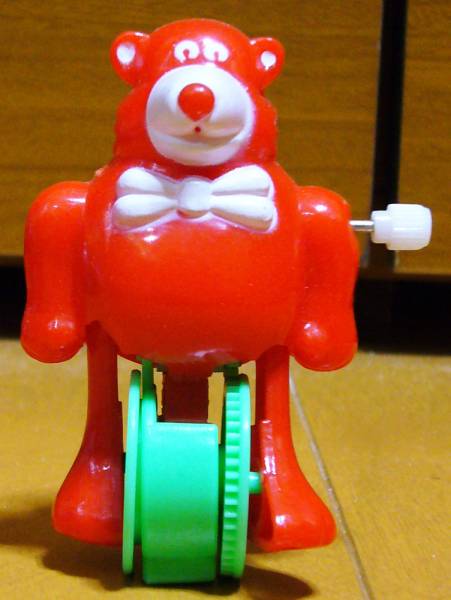 ビンテージ ゼンマイ歩行 おもちゃ 一輪車に乗る赤いクマさん