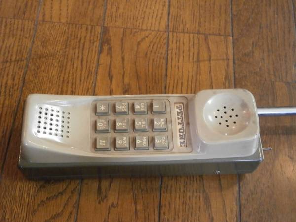  mobile telephone? cordless handset? transceiver? old thing. 