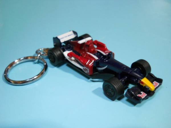 キーホルダー スクーデリア・トロ・ロッソ コスワース STR1 F-1 レッドブル マスコット アクセサリー